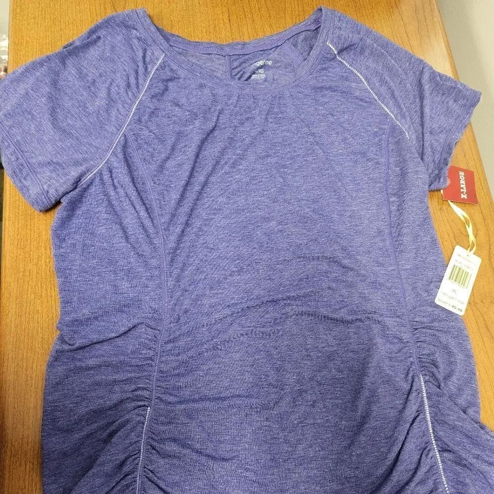 NWT tangerine XL purple top. Short sleeved athletic top.